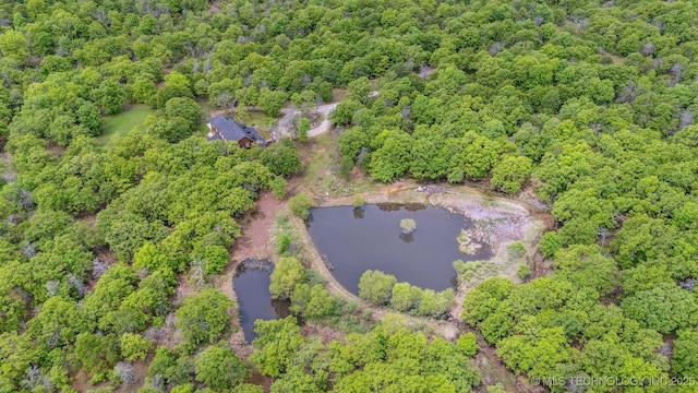 1001 County Road 2265, Skiatook, OK 74070 - aerial view of property and surrounding area with a large body of water and a forest