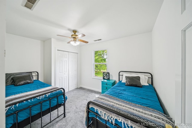 1001 County Road 2265, Skiatook, OK 74070 - carpeted bedroom with a closet, ceiling fan, and baseboards
