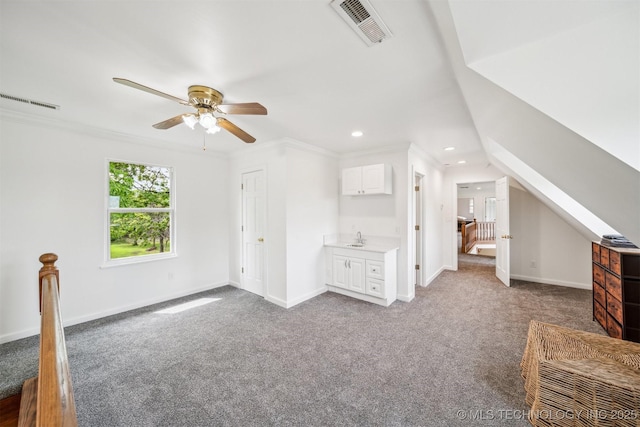 1001 County Road 2265, Skiatook, OK 74070 - unfurnished bedroom with carpet floors, recessed lighting, baseboards, a sink, and crown molding