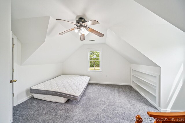 1001 County Road 2265, Skiatook, OK 74070 - carpeted bedroom with baseboards, ceiling fan, and lofted ceiling