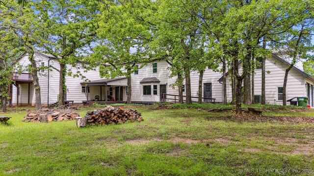 1001 County Road 2265, Skiatook, OK 74070 - back of property with a yard
