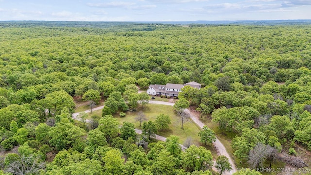 1001 County Road 2265, Skiatook, OK 74070 - view from above of property with a heavily wooded area