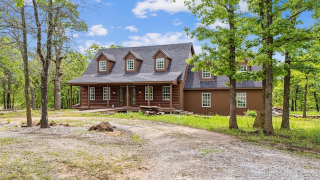 1001 County Road 2265, Skiatook, OK 74070 - view of front of house with a porch and roof with shingles