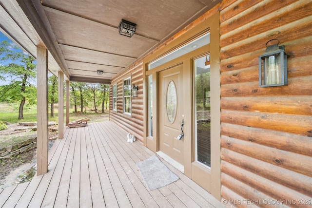 1001 County Road 2265, Skiatook, OK 74070 - wooden deck with covered porch