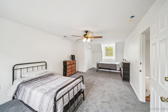 1001 County Road 2265, Skiatook, OK 74070 - carpeted bedroom with a closet, a ceiling fan, and baseboards