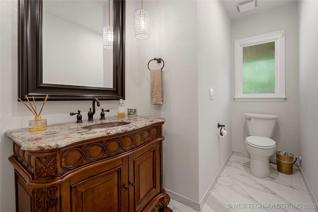 4728 S Atlanta Pl, Tulsa, OK 74105 - bathroom featuring marble finish flooring, vanity, toilet, and baseboards