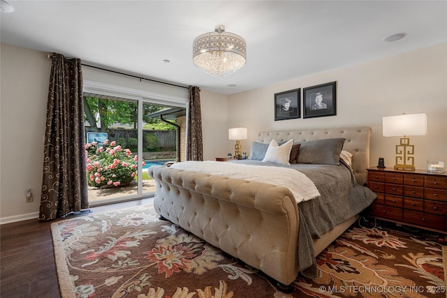 4728 S Atlanta Pl, Tulsa, OK 74105 - bedroom with access to outside, wood finished floors, baseboards, and a chandelier