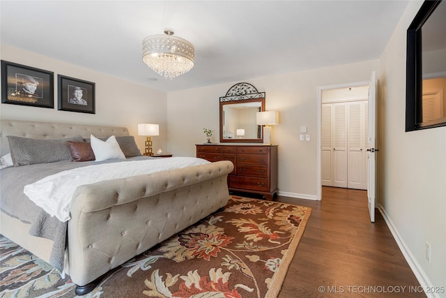 4728 S Atlanta Pl, Tulsa, OK 74105 - bedroom with dark wood finished floors, a chandelier, and baseboards