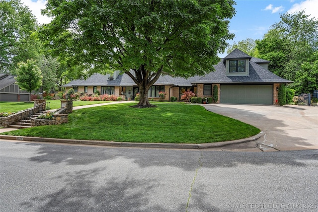 4728 S Atlanta Pl, Tulsa, OK 74105 - view of front facade featuring concrete driveway, a garage, a front lawn, brick siding, and roof with shingles
