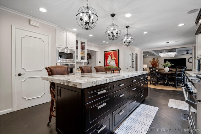 4728 S Atlanta Pl, Tulsa, OK 74105 - kitchen featuring appliances with stainless steel finishes, a chandelier, white cabinetry, recessed lighting, and ornamental molding