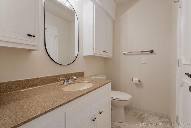 4728 S Atlanta Pl, Tulsa, OK 74105 - bathroom featuring vanity, marble look tile flooring, toilet, and baseboards