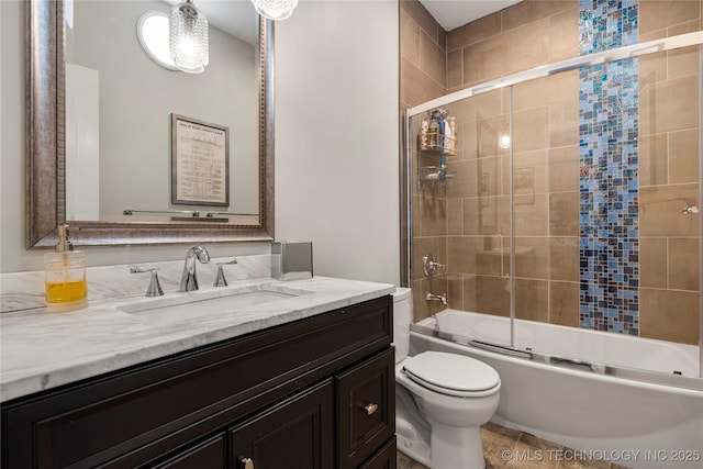 4728 S Atlanta Pl, Tulsa, OK 74105 - bathroom featuring vanity, toilet, and enclosed tub / shower combo