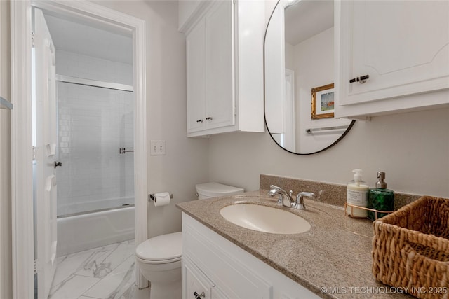 4728 S Atlanta Pl, Tulsa, OK 74105 - bathroom with vanity, marble look tile flooring, toilet, and bath / shower combo with glass door