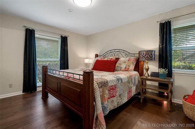 4728 S Atlanta Pl, Tulsa, OK 74105 - bedroom featuring dark wood-style floors and baseboards