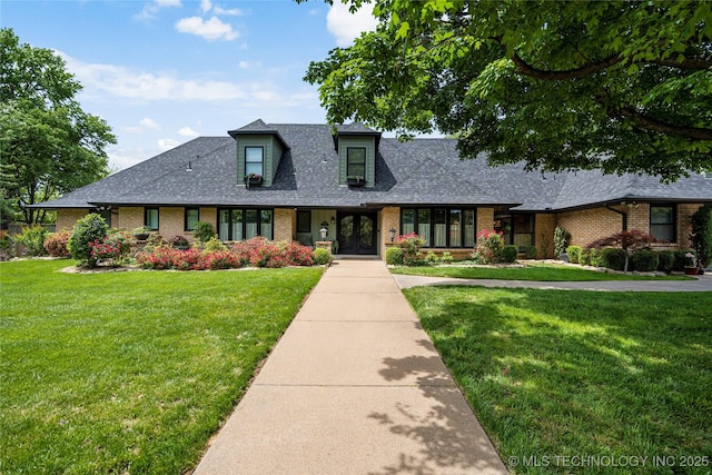 4728 S Atlanta Pl, Tulsa, OK 74105 - view of front facade featuring brick siding, roof with shingles, a front lawn, and french doors