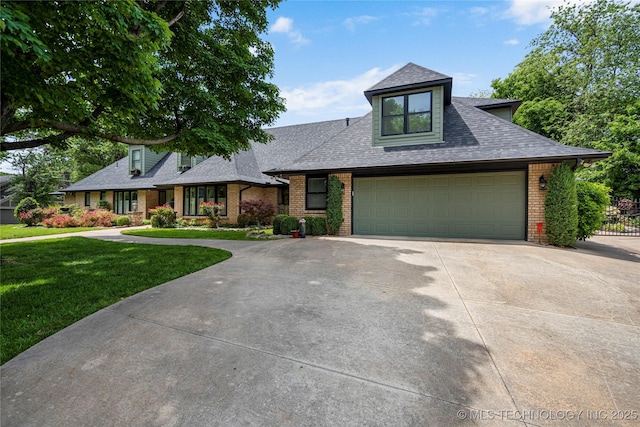 4728 S Atlanta Pl, Tulsa, OK 74105 - view of front of house with concrete driveway, brick siding, a shingled roof, and a garage