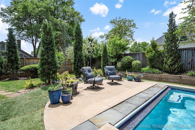 4728 S Atlanta Pl, Tulsa, OK 74105 - view of swimming pool with a fenced backyard and a patio