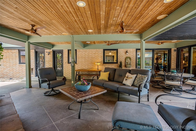 4728 S Atlanta Pl, Tulsa, OK 74105 - view of patio / terrace with ceiling fan and an outdoor living space