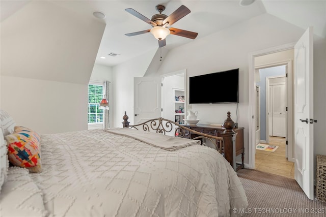 4728 S Atlanta Pl, Tulsa, OK 74105 - carpeted bedroom featuring vaulted ceiling, ceiling fan, and tile patterned flooring