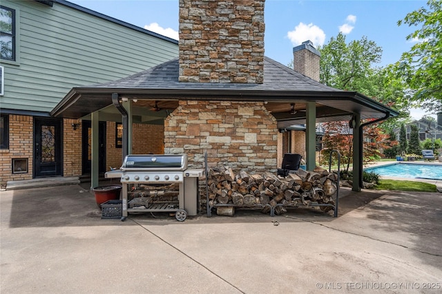 4728 S Atlanta Pl, Tulsa, OK 74105 - view of patio / terrace with an outdoor pool, a ceiling fan, and area for grilling