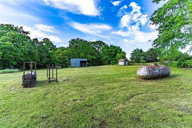 34047 W 191st St S, Bristow, OK 74010 - view of green lawn featuring an outdoor structure