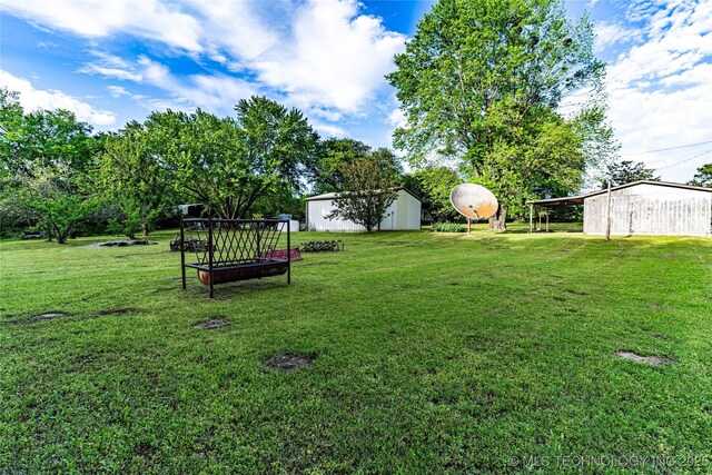 34047 W 191st St S, Bristow, OK 74010 - view of green lawn with an outbuilding
