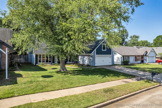 2313 W Nashville Ct, Broken Arrow, OK 74012 - view of front facade featuring a garage and driveway