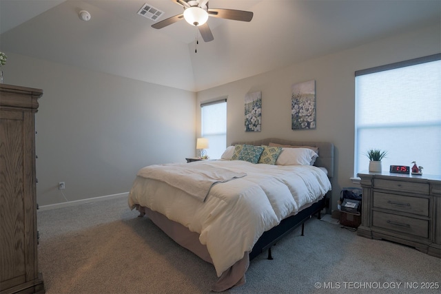 bedroom with carpet floors, baseboards, a ceiling fan, and lofted ceiling