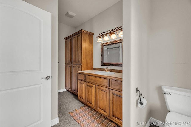 32290 S 630th Rd, Jay, OK 74346 - bathroom with baseboards, vanity, and toilet