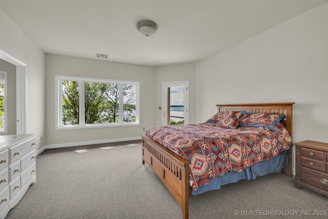 32290 S 630th Rd, Jay, OK 74346 - carpeted bedroom featuring baseboards and access to exterior