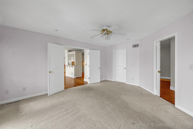 32290 S 630th Rd, Jay, OK 74346 - unfurnished bedroom with carpet, baseboards, and ceiling fan