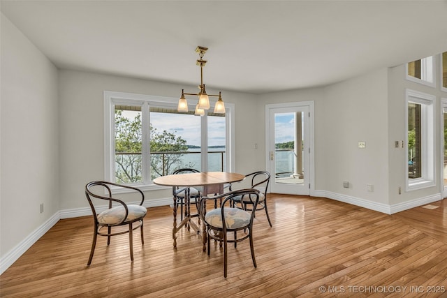 32290 S 630th Rd, Jay, OK 74346 - dining room with plenty of natural light, light wood-style flooring, and baseboards