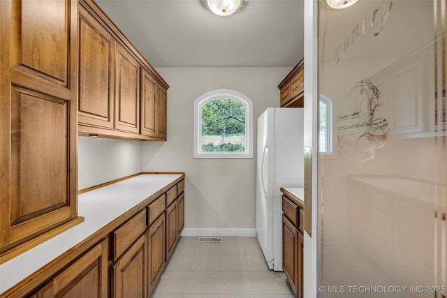 32290 S 630th Rd, Jay, OK 74346 - washroom with baseboards and light tile patterned floors