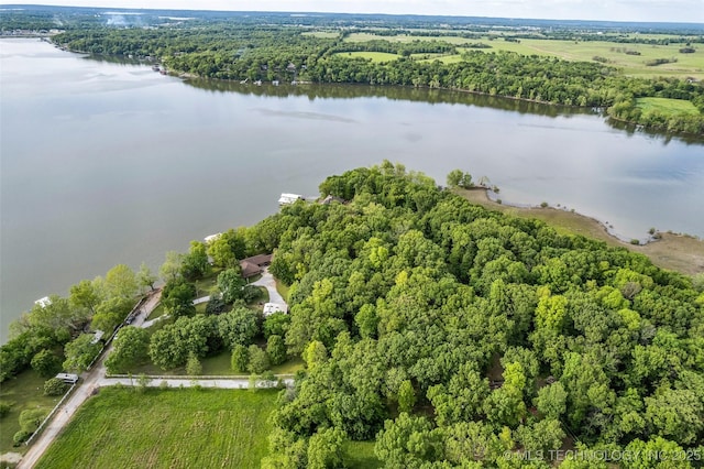 32290 S 630th Rd, Jay, OK 74346 - aerial overview of property's location with a nearby body of water and a heavily wooded area