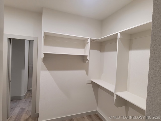 14474 N 50th W Ave, Skiatook, OK 74070 - spacious closet featuring wood finished floors