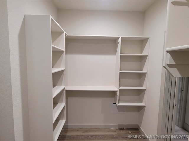 14474 N 50th W Ave, Skiatook, OK 74070 - spacious closet featuring wood finished floors