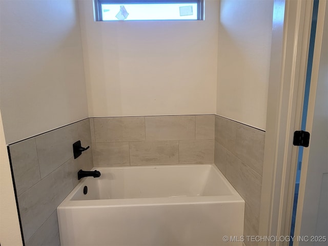 14474 N 50th W Ave, Skiatook, OK 74070 - bathroom featuring a tub to relax in