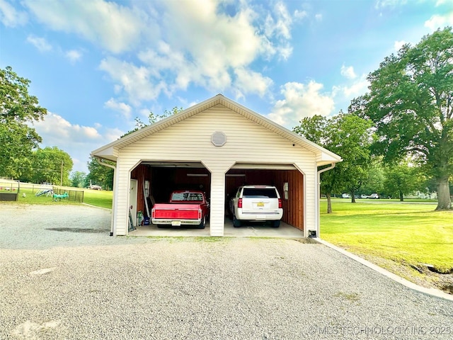 809 N K St, Quinton, OK 74561 - view of detached garage