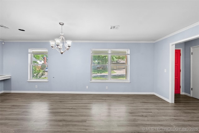 5854 E 46th Pl, Tulsa, OK 74135 - empty room featuring a chandelier, crown molding, wood finished floors, and baseboards