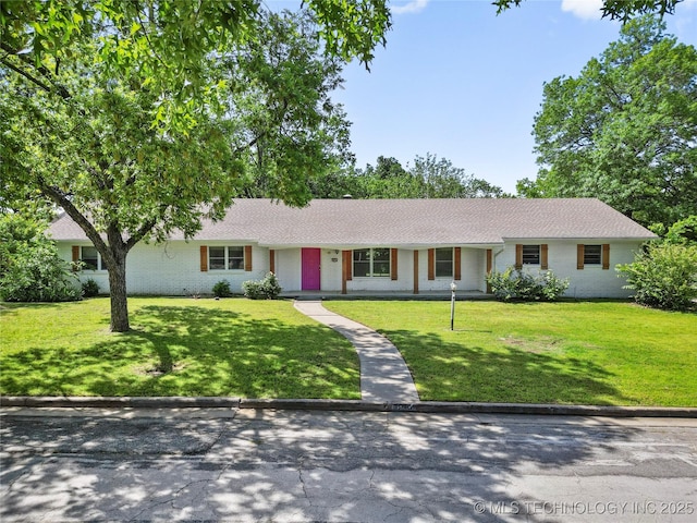 5854 E 46th Pl, Tulsa, OK 74135 - ranch-style house with brick siding, a front lawn, and roof with shingles