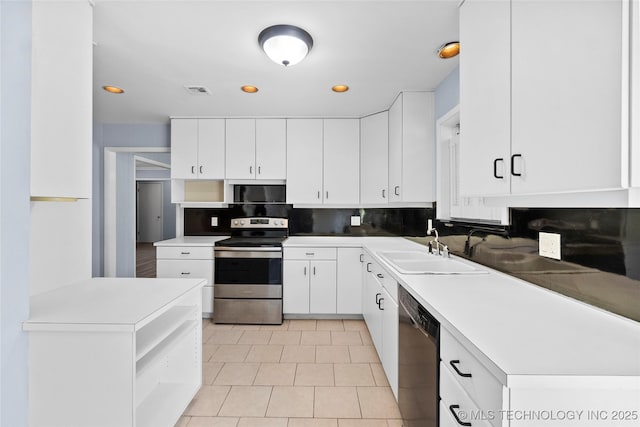 5854 E 46th Pl, Tulsa, OK 74135 - kitchen featuring stainless steel electric range oven, dishwashing machine, a sink, open shelves, and recessed lighting
