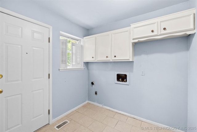 5854 E 46th Pl, Tulsa, OK 74135 - clothes washing area with washer hookup, hookup for an electric dryer, cabinet space, and baseboards