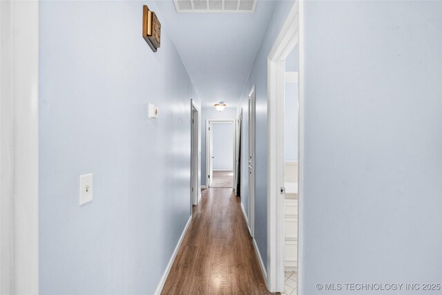 5854 E 46th Pl, Tulsa, OK 74135 - corridor with wood finished floors and baseboards