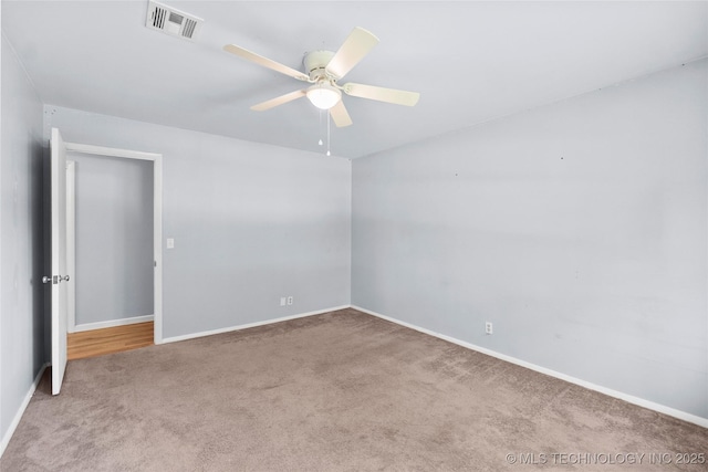 5854 E 46th Pl, Tulsa, OK 74135 - spare room with carpet flooring, ceiling fan, and baseboards