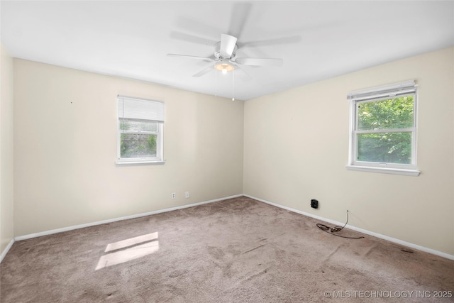 5854 E 46th Pl, Tulsa, OK 74135 - empty room featuring healthy amount of natural light, carpet flooring, and a ceiling fan