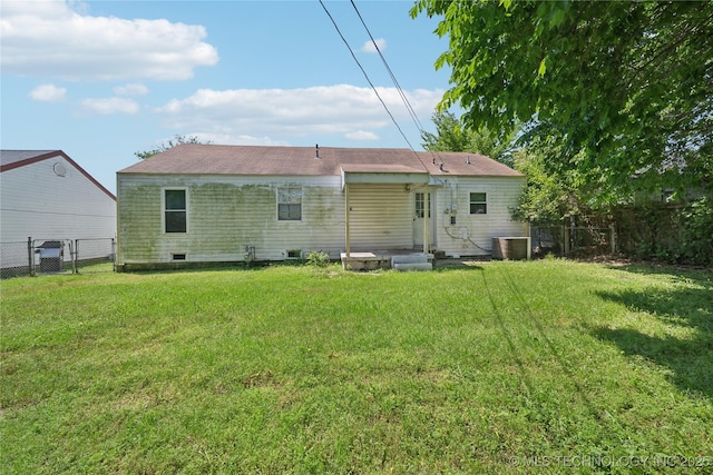 back of house featuring central AC