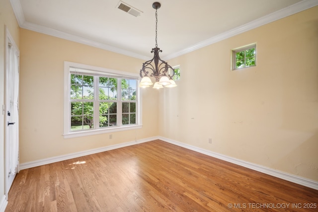 7287 E 111th Pl, Bixby, OK 74008 - unfurnished room with light wood-style floors, a chandelier, baseboards, and ornamental molding