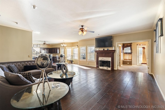 5446 E 88th St, Tulsa, OK 74137 - living area featuring a ceiling fan, a fireplace, dark wood-style floors, baseboards, and ornamental molding