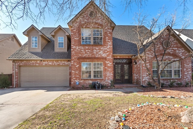5446 E 88th St, Tulsa, OK 74137 - traditional-style home with french doors, brick siding, and roof with shingles