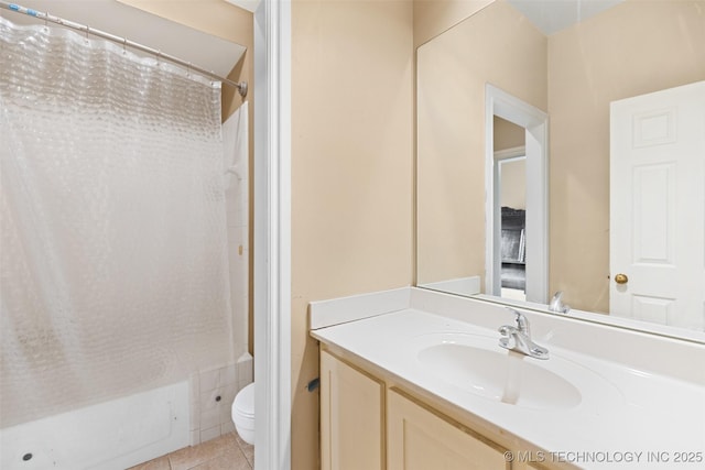 5446 E 88th St, Tulsa, OK 74137 - bathroom with toilet, tile patterned floors, vanity, and shower / bath combo with shower curtain